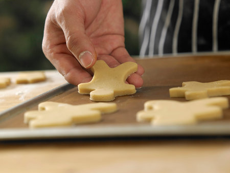 chef  arranging christmas cookies