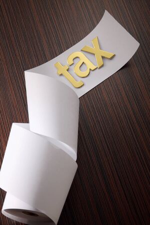 word tax on the roll of paperの写真素材