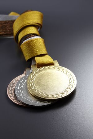 gold,silver and bronze medals in a groupの写真素材
