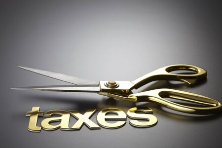 scissors and the alphabet TAXESの写真素材