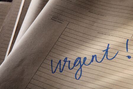 brown color file with word urgentの写真素材