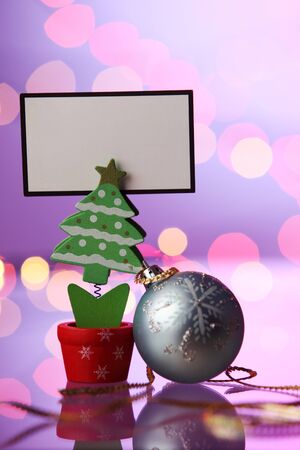 handmade christmas tree holding blank cardの写真素材