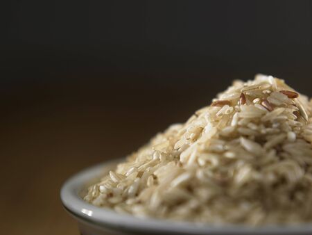 close up brown rice in the bowlの写真素材