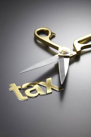scissors and the alphabet TAXの写真素材