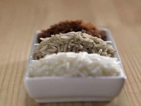 variation of rice in a saucerの写真素材