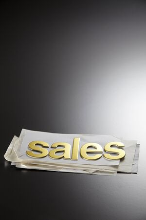 alphabet sales on stack of thin receiptの写真素材
