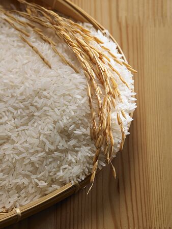 close up of the white rice and paddyの写真素材