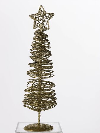 wire christmas tree on the white backgroundの写真素材