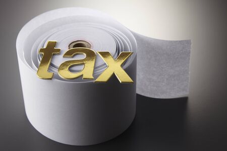 tax alphabets o the adding machine tapeの写真素材