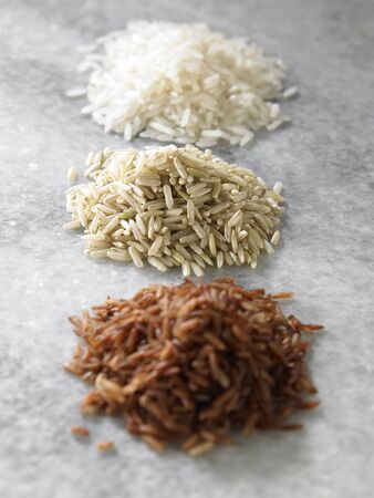 few different type of rice on the tableの写真素材