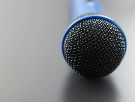close up of the blue wired microphoneの写真素材