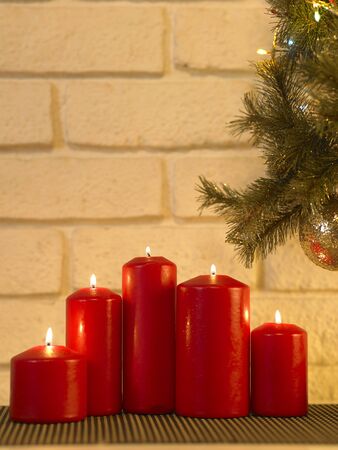 candle light under the christmas treeの写真素材