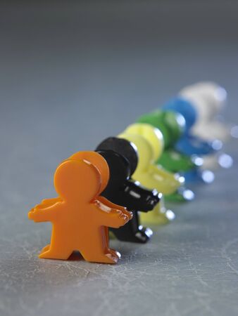 concept of the human toy in a lineの写真素材