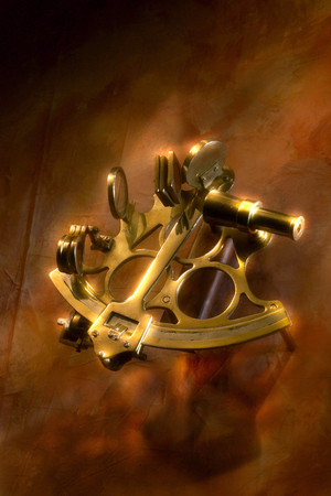 antique compass on the warm backgroundの写真素材