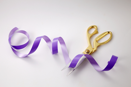 cutting purple ribbon -open ceremony conceptの写真素材