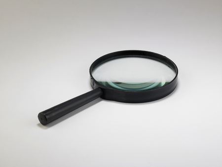magnifier glass on the white backgroundの写真素材