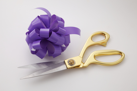 opening ceremony concepet purple ribbon bows and gold scissorsの写真素材