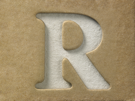 cut out alphabet r on the brown cardboardの写真素材