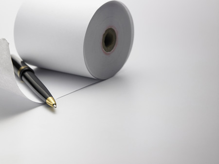 pen and roll of paperの写真素材