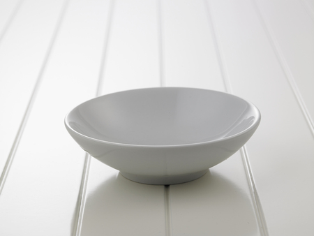 bowl on the white surface tableの写真素材
