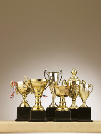 group of trophies on the tableの写真素材