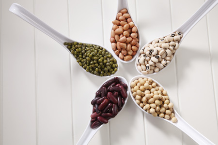 variety of beans group in five spoonsの写真素材