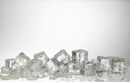 cold ice cubes on the white backgroundの写真素材