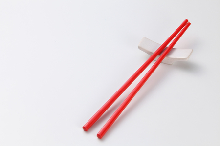 Pair of chopsticks on white backgroundの写真素材
