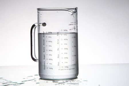 measuring jar fill with waterの写真素材