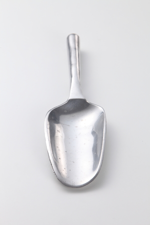 silver scoop on the white backgroundの写真素材
