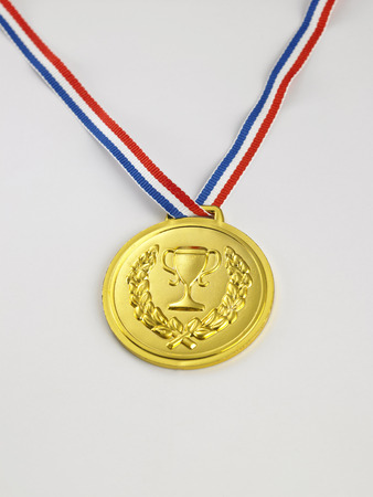 golden medal on the white backgroundの写真素材