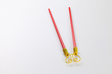 Training Chopsticks on a white backgroundの写真素材