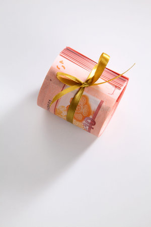 Malaysia ringgit roll tied with ribbon