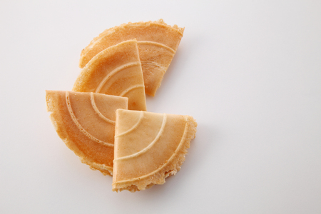 Kuih Kapit or the Malaysian Chinese Love Letter biscuit over white backgroundの写真素材
