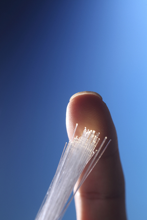 finger touching the fiber opticの写真素材