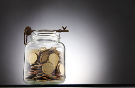 key on top of the saving jar