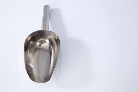 Aluminum transfer scoop  isolated on whiteの写真素材