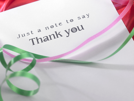 Thank you card with the ribbonの写真素材