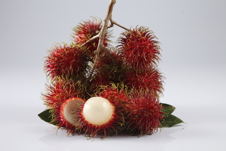asian fruit rambutan on the plain backgroundの写真素材