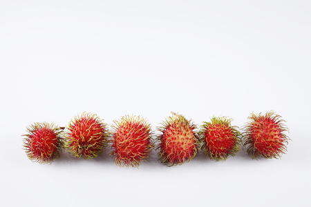 asian fruit rambutan on the plain backgroundの写真素材