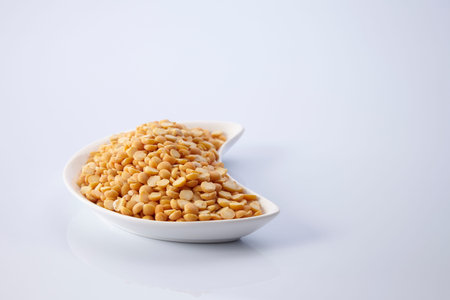 yellow daal on the white background