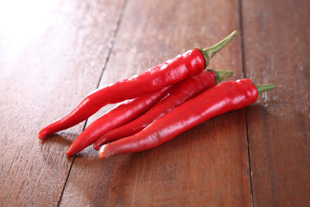 red chili on the wooden table