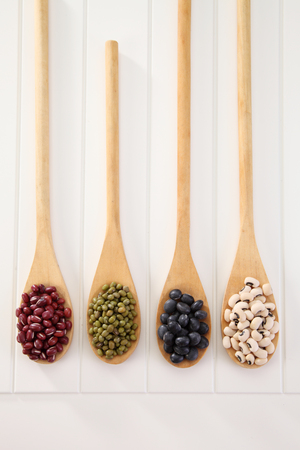 various type of beans on the white backgroundの写真素材
