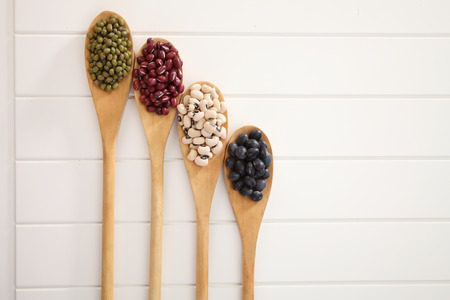 various type of beans on the white backgroundの写真素材