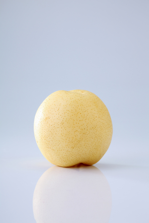 Yellow pear isolated on white backgroundの写真素材