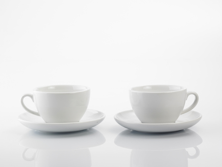 two white coffee cup on the white backgroundの写真素材