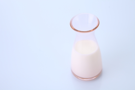 bottle of milk on the white backgroundの写真素材