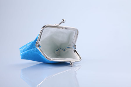 empty blue purse open on the white background