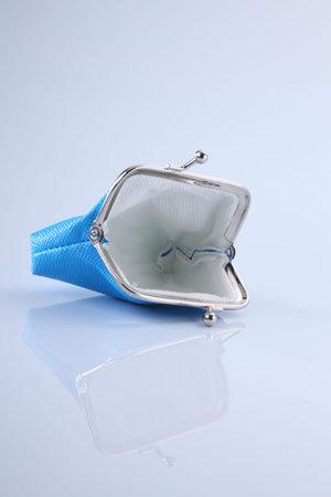 empty blue purse open on the white background