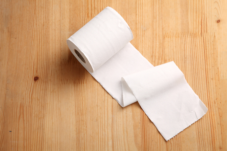 toilet roll on the wooden backgroundの写真素材